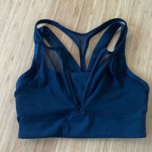 Women’s Lululemon, black strapy sports bra. Size 4. In great condition.